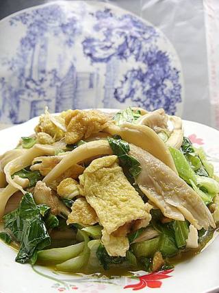 平菇炒蛋的做法