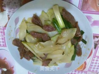 腊肠炒芥蓝头的做法
