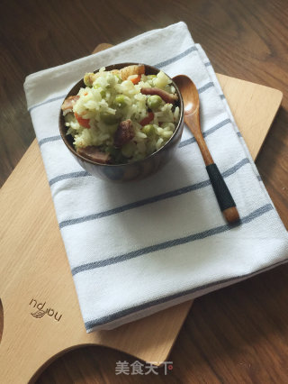 腊肉豌豆焖干饭的做法