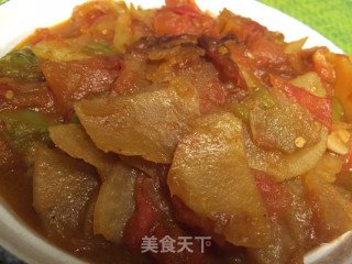 土豆炒西红柿辣椒的做法