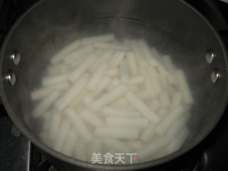 泡菜炒年糕的做法步骤：2