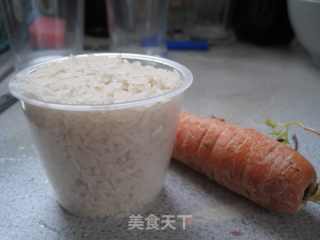 胡萝卜鸡骨粥的做法步骤：4