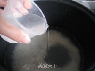 胡萝卜鸡骨粥的做法步骤：4