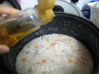 胡萝卜鸡骨粥的做法步骤：4