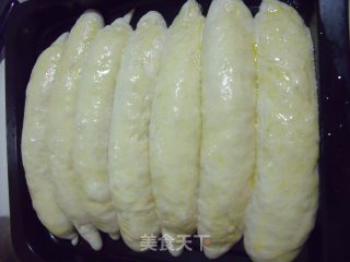 超级松软香甜极具诱惑的---牛奶排包的做法步骤：18