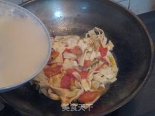西红柿炒千张的做法步骤：5