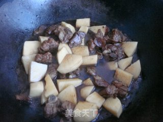 土豆烧排骨的做法步骤：7