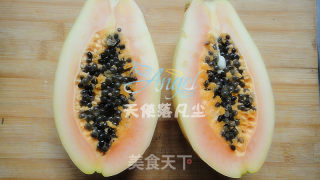幸福的像花儿一样——橙汁木瓜的做法步骤：2