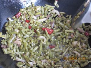 酸豆角炒肉的做法步骤：5