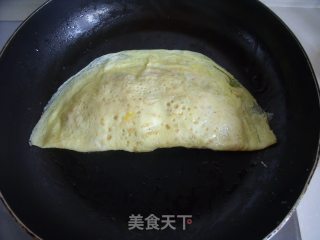 给剩米饭披上华丽的外衣—蛋包饭的做法步骤：11