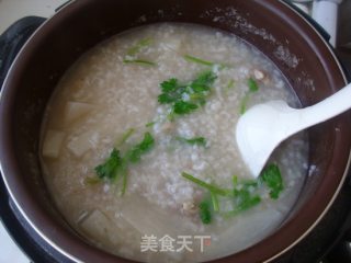 白萝卜骨头粥的做法步骤：6