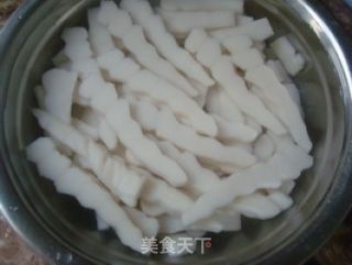 雪菜肉丝炒年糕的做法步骤：2