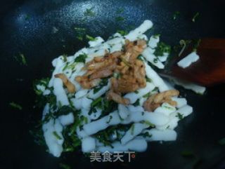 雪菜肉丝炒年糕的做法步骤：7