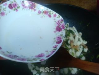 雪菜肉丝炒年糕的做法步骤：8