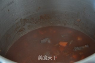 红酒烧牛腩百叶结的做法步骤：7