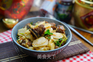 糖醋排骨炒年糕的做法