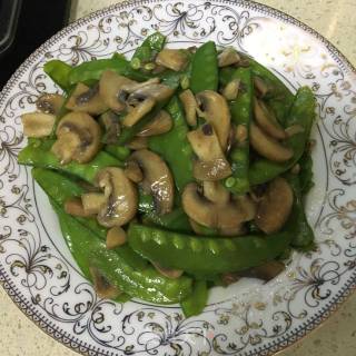 口蘑炒荷兰豆的做法