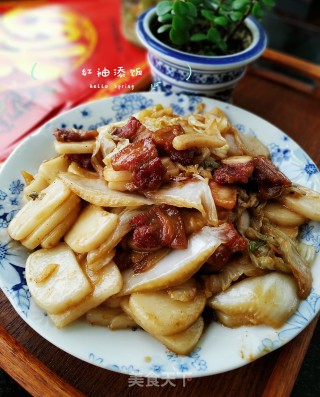 五花肉炒年糕的做法