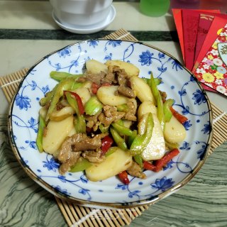 瘦肉西芹炒年糕的做法