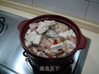 冬季泡菜吃法“酸汤鱼头”的做法步骤：12