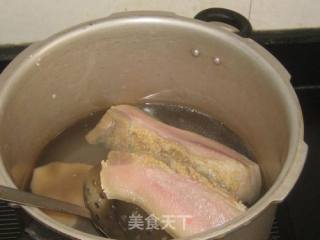 咸猪头肉炖黄豆的做法步骤：4