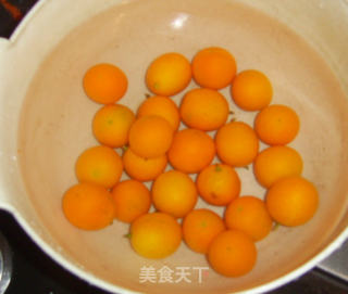糖渍金桔的做法步骤：1