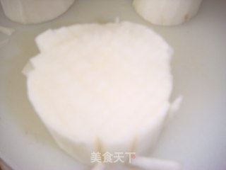 “萝卜金盏菊”喜迎新春的做法步骤：2
