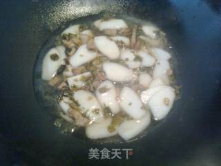 家乡的味道——雪菜肉丝炒年糕的做法步骤：5