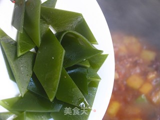 让你不知不觉间多加几碗饭——萝卜海带烧排骨的做法步骤：12
