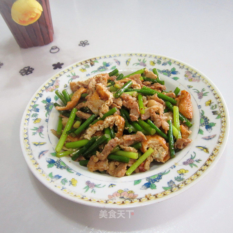 猪肉蒜苔炒油豆腐的做法