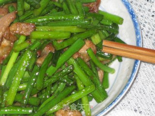 猪肉炒蒜苔的做法步骤：6