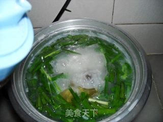 猪红韭菜粥的做法步骤：7