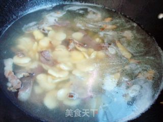 蚕豆煮枇杷叶的做法步骤：7