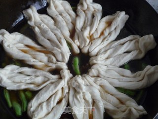饭菜一锅出——排骨豆角粘卷子的做法步骤：12
