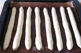 小朋友都喜欢的牛奶杏仁片排包的做法步骤：7
