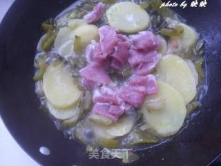 酸菜烧土豆的做法步骤：7