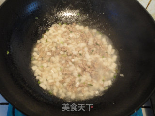 白萝卜肉末米粥的做法步骤：7
