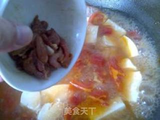 番茄鸡蛋豆腐汤的做法步骤：7