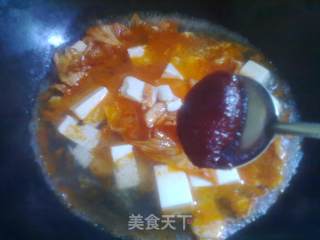 重口味的——酸辣泡菜豆腐汤的做法步骤：7
