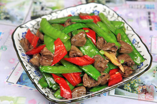 荷兰豆炒鸡心的做法步骤：11