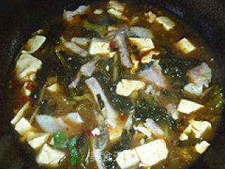 酸菜鱼（附鱼肉滑嫩小窍门）的做法步骤：7