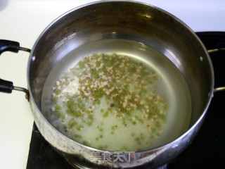 苦菊鱿鱼干粥的做法步骤：1