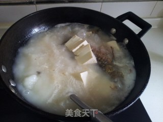 豆腐鲗鱼汤的做法步骤：7