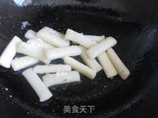桂花芝麻糖炒年糕的做法步骤：4
