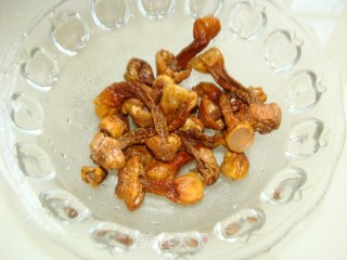 猪尾炖巴西菇的做法步骤：6