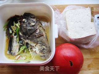茄豆腐黑鱼头的做法步骤：1