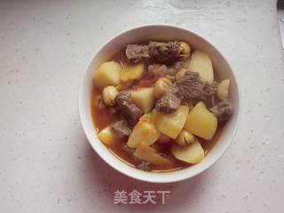 土豆西红柿莲子炖牛肉的做法步骤：7