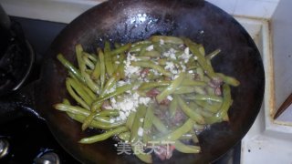 豆角炒肉的做法步骤：7
