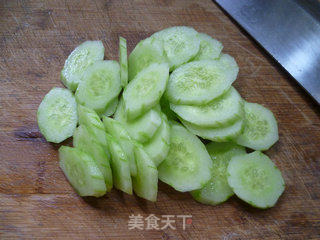 橄榄菜炒青瓜的做法步骤：4