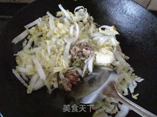 腌肉娃娃菜煮年糕的做法步骤：6